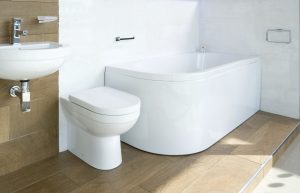 Porcelanosa NK-one basin and back to wall toilet, chrome bottle trap with Carron status bath