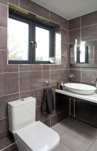 Supply and fitting of tiles and bathroom