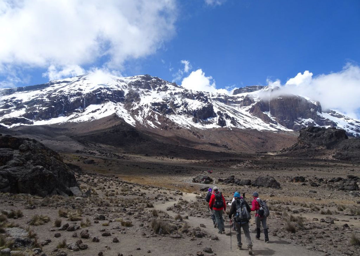 Tom walking up Kilimanjaro